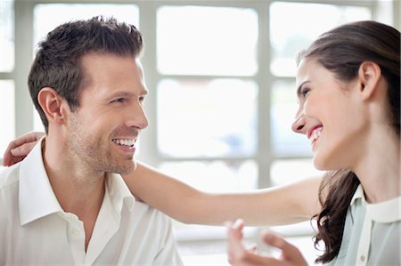 Close-up of a couple smiling Stock Photo - Premium Royalty-Free, Code: 6108-06166391