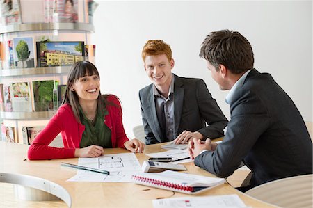 relation with business clients in office - Real estate agent discussing property documents to his clients Stock Photo - Premium Royalty-Free, Code: 6108-06166577