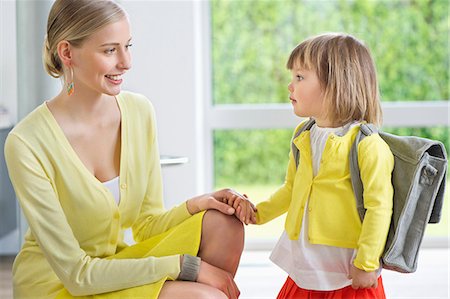 family backpack - Little girl getting ready for school Stock Photo - Premium Royalty-Free, Code: 6108-06166812