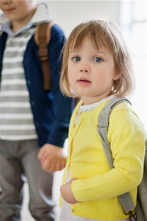 school bags - Portrait of a schoolgirl and a schoolboy Stock Photo - Premium Royalty-Free, Code: 6108-06166817