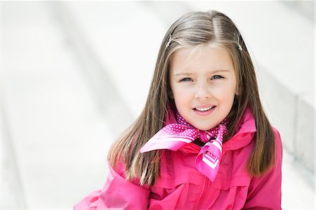 Portrait of a girl smiling Stock Photo - Premium Royalty-Free, Code: 6108-06167019