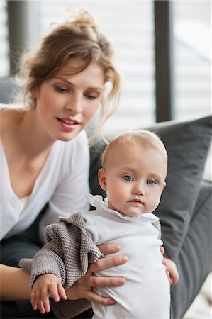 Close-up of a woman with her daughter Stock Photo - Premium Royalty-Free, Code: 6108-06167746