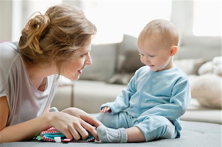 simsearch:6108-06167733,k - Woman playing with her daughter Stock Photo - Premium Royalty-Free, Code: 6108-06167727