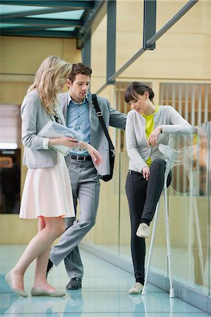 picture of a male showing entire body - Woman leaning against, Europe Stock Photo - Premium Royalty-Free, Code: 6108-06167987