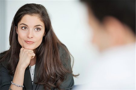 staring - Close-up of a businesswoman thinking Stock Photo - Premium Royalty-Free, Code: 6108-06167984