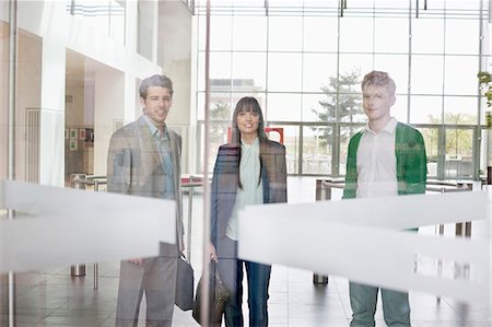 europe doors - Portrait of business executives in an office lobby Stock Photo - Premium Royalty-Free, Code: 6108-06168024