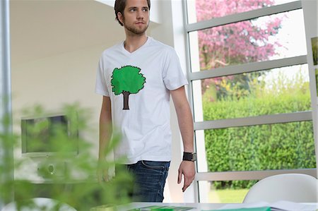 ecology - Man standing in a room Stock Photo - Premium Royalty-Free, Code: 6108-06168134