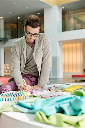 pen and paper - Male fashion designer working in an office Stock Photo - Premium Royalty-Free, Code: 6108-06168272
