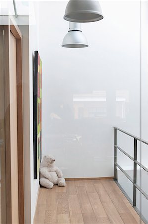 rail - Teddy bear in the corner of a house Stock Photo - Premium Royalty-Free, Code: 6108-06168477
