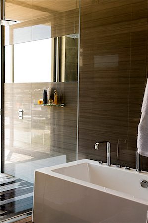 faucet in the bathroom - Bathtub in a bathroom Stock Photo - Premium Royalty-Free, Code: 6108-06904346
