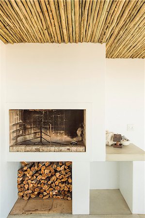 rustic modern - Fireplace with firewood Stock Photo - Premium Royalty-Free, Code: 6108-06904439