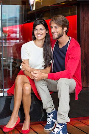 seated skirt - Romantic couple in a restaurant Stock Photo - Premium Royalty-Free, Code: 6108-06905182