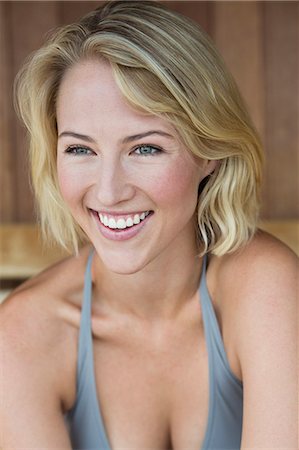 Close-up of a smiling woman in a sauna Stock Photo - Premium Royalty-Free, Code: 6108-06905536