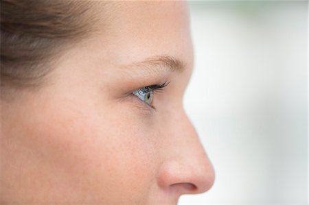 Close-up of a woman's eye Photographie de stock - Premium Libres de Droits, Code: 6108-06905706