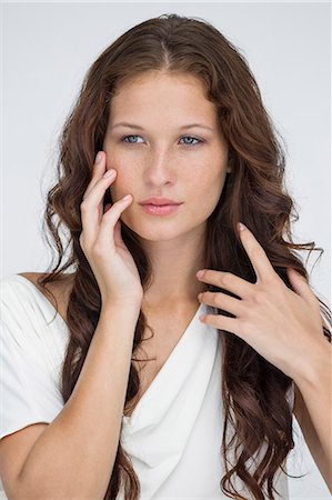 Close-up of a beautiful woman posing Stock Photo - Premium Royalty-Free, Code: 6108-06906383