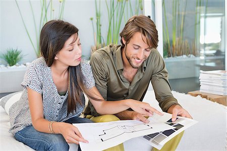 renovation - Couple matching blueprint with color swatch Stock Photo - Premium Royalty-Free, Code: 6108-06906422