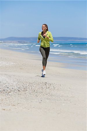 running blonde woman - Woman jogging on the beach Foto de stock - Sin royalties Premium, Código: 6108-06906662