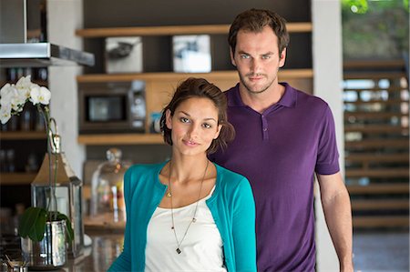 simsearch:6108-06904818,k - Portrait of a couple standing together Photographie de stock - Premium Libres de Droits, Code: 6108-06907124