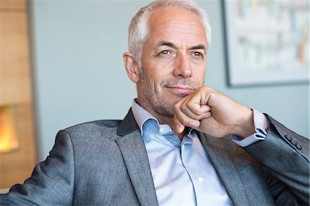 reflective vest - Close-up of a businessman thinking Photographie de stock - Premium Libres de Droits, Code: 6108-06907203