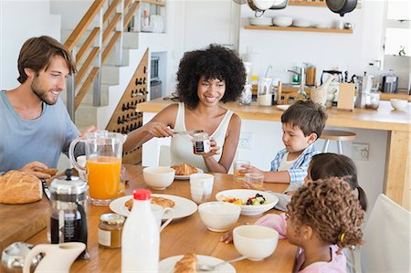 father - Family at breakfast table Stock Photo - Premium Royalty-Free, Code: 6108-06907654