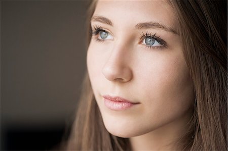 preteen beautiful face - Teenage girl thinking Stock Photo - Premium Royalty-Free, Code: 6108-07969544