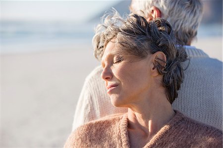 Close-up of an old couple on the beach Stock Photo - Premium Royalty-Free, Code: 6108-08663042