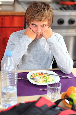 frustrated cook - France, young boy eating Stock Photo - Premium Royalty-Free, Code: 6108-08636852