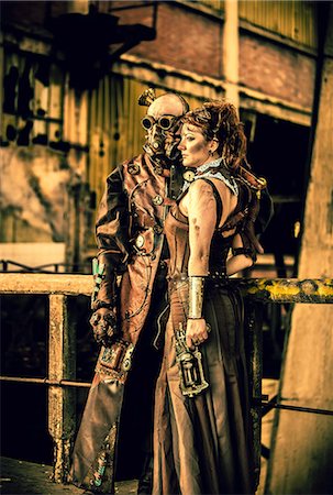 sepia - Armed steampunk couple Photographie de stock - Premium Libres de Droits, Code: 6108-08636814