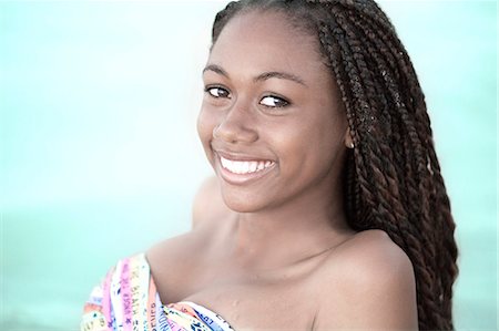 West indian smiling young girl Stock Photo - Premium Royalty-Free, Code: 6108-08636995