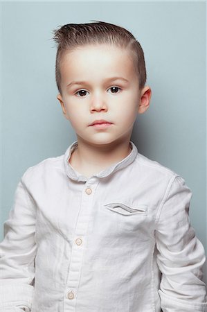 simsearch:6108-08637423,k - Portrait of a boy Photographie de stock - Premium Libres de Droits, Code: 6108-08637396