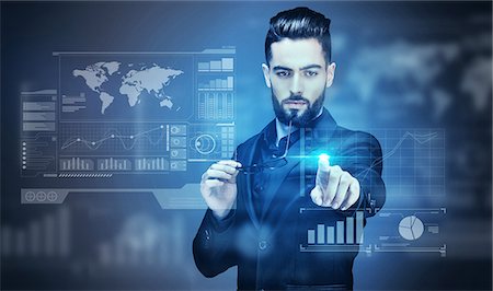 stock exchange - Portrait of a young Businessman touching a virtual screen Stock Photo - Premium Royalty-Free, Code: 6108-08637338