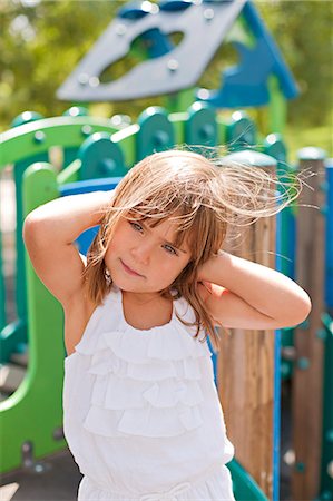 simsearch:6108-05865608,k - Cute girl in playground Stock Photo - Premium Royalty-Free, Code: 6108-08909518