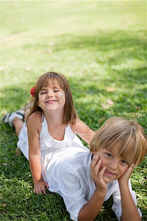 simsearch:6108-05865608,k - Boy and Girl having fun in park Stock Photo - Premium Royalty-Free, Code: 6108-08909523