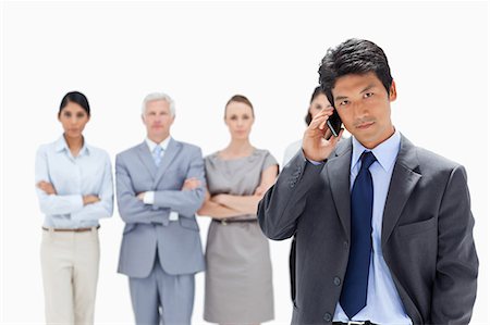 simsearch:6109-06002664,k - Close-up of a business team with an Asian man making a call in foreground Foto de stock - Sin royalties Premium, Código: 6109-06002695