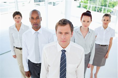 female cross arms confident smile - Young salesman standing together with his team Stock Photo - Premium Royalty-Free, Code: 6109-06005778