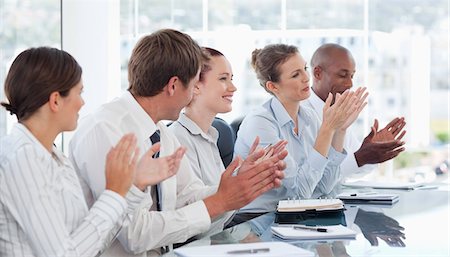 people clapping - Young salesteam applauding after a presentation Stock Photo - Premium Royalty-Free, Code: 6109-06005835