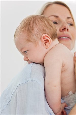 simsearch:6109-06006613,k - Mother embracing her little baby Stock Photo - Premium Royalty-Free, Code: 6109-06006595