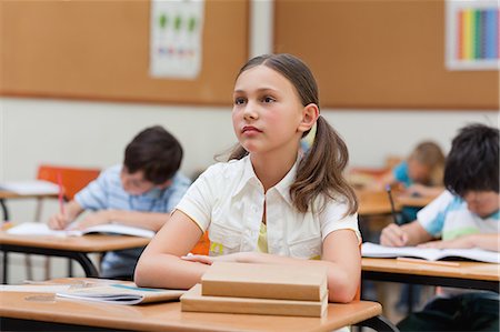 simsearch:6109-06007463,k - Elementary student looking to the blackboard Stock Photo - Premium Royalty-Free, Code: 6109-06007456