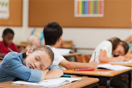 school class room sleeping girl - Side view of young schoolgirl taking a nap Stock Photo - Premium Royalty-Free, Code: 6109-06007469