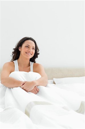 female sitting on white - Happy wake up Stock Photo - Premium Royalty-Free, Code: 6109-06194219