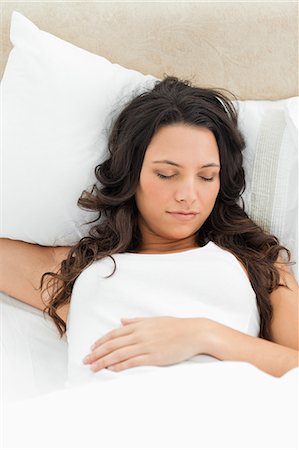 sleeping class - Close-up of a lovely brunette sleeping Stock Photo - Premium Royalty-Free, Code: 6109-06194221