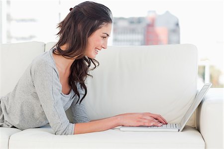 fideo - Beaming student chatting online Stock Photo - Premium Royalty-Free, Code: 6109-06194766