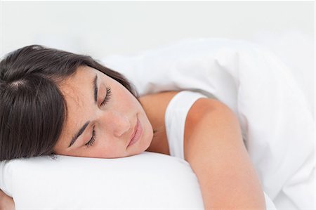 sieste - Close-up of a brunette having a sweet nap Foto de stock - Sin royalties Premium, Código: 6109-06194925