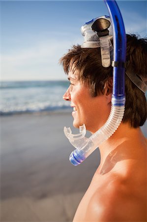 diving - Young attractive man wearing a snorkel and a mask Stock Photo - Premium Royalty-Free, Code: 6109-06195373