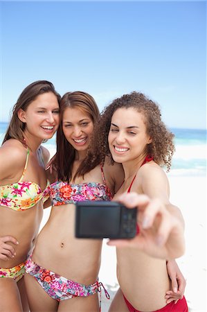 self image - Three friends smiling as they pose for a photo Stock Photo - Premium Royalty-Free, Code: 6109-06195552
