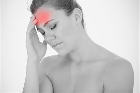 simsearch:6109-06684724,k - Woman touching head in pain Stock Photo - Premium Royalty-Free, Code: 6109-06684719