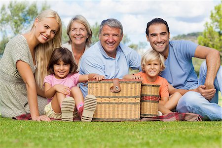 picnic on grass - Multi-generation family portrait in the park Stock Photo - Premium Royalty-Free, Code: 6109-06684945