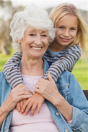 Elderly woman posing with her cute granddaughter Stock Photo - Premium Royalty-Free, Code: 6109-06684989