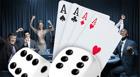 Attractive group cheering at the casino with digital cards and dice Foto de stock - Sin royalties Premium, Código: 6109-06685006