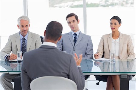 simsearch:6109-06781334,k - Business people listening to job candidate Stock Photo - Premium Royalty-Free, Code: 6109-06781330